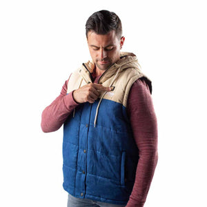Man wearing a blue and beige hooded Fobi heated vest