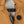 Mobile Warming tan leather gloves with black plastic buckle and Hipora tag