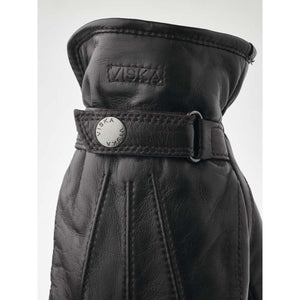Hestra black leather glove with wrist strap and metal button detail