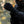 Person wearing black Venture Heat heated gloves with power button on the wrist