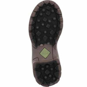 Bottom view of a Muck boot showing the treaded rubber outsole