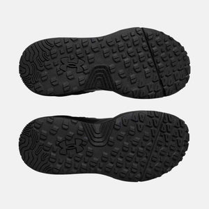 Under Armour shoe outsoles with black textured tread pattern