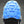 Winter Walking ice cleat with blue rubber traction pad and metal studs on a black shoe sole