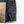 Interior view of Mobile Warming jacket showing black lining with topographic pattern and zippered pocket