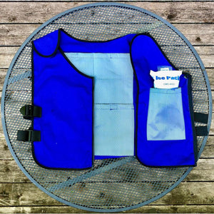 Blue cooling vest with mesh lining and ice pack insert on a metal table