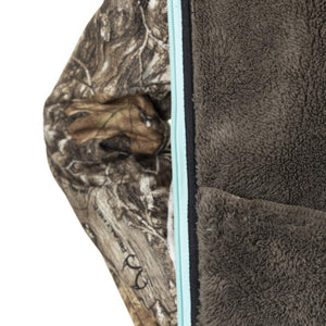 DSG Outerwear jacket showing camo sleeve and brown fleece interior with light blue zipper