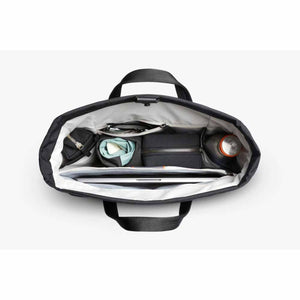 Top view of open Bellroy tote bag filled with laptop and personal accessories