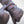 Black leather motorcycle glove with red logo on the wrist strap