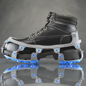 Winter Walking ice cleat traction device attached to a black work boot