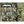 AO Coolers bag with camouflage pattern and green strap attachment