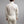 Back view of a person wearing a cream Merino Skins long sleeve turtleneck thermal top