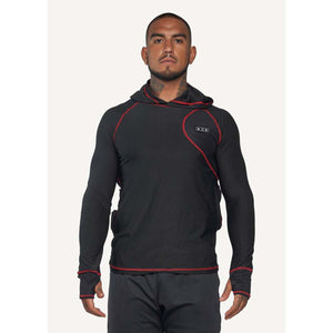 Man wearing a black long sleeve hooded shirt with red stitching and thumb holes