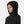 Person wearing a black Helly Hansen hooded jacket