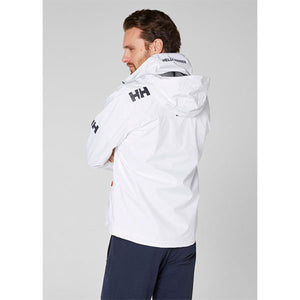 Man wearing a white Helly Hansen hooded jacket with HH branding