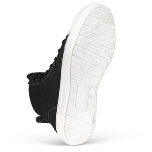 Black high top sneaker showing white rubber sole with tread pattern
