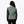 Back view of a woman wearing a sage green Mobile Warming quilted jacket with dark sleeves