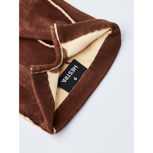 Interior of brown Hestra glove showing size 9 label