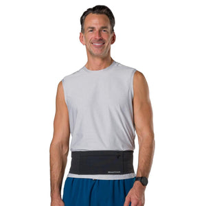 Man wearing a black Nathan running belt over a grey sleeveless shirt
