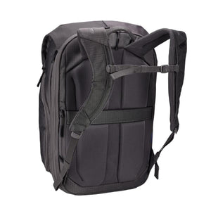 Back view of Thule black backpack showing padded shoulder straps and mesh back panel