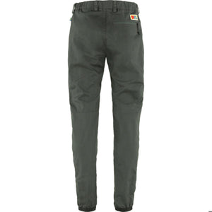 Back view of dark green Fjallraven trousers with elastic waistband and zippered back pocket