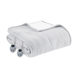 Folded light grey Serta heated blanket with two digital controllers