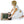 Woman kneeling and rolling up a Healthy Line infrared heating mat with circular stone discs