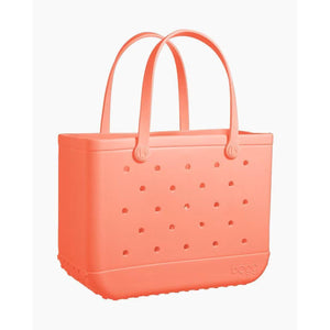 Coral Bogg Bag tote with perforated design and two handles