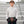Boy wearing a grey hoodie and a black ActionHeat Chicago Bears hand warmer pouch