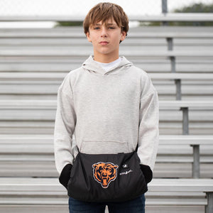 Boy wearing a grey hoodie and a black ActionHeat Chicago Bears hand warmer pouch
