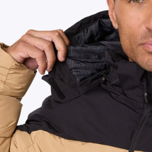 Close up of Mobile Warming jacket hood showing black lining and tan exterior