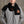 ActionHeat black fleece scarf with Cincinnati Bengals logo and text worn by a man in a grey jacket
