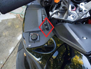 Gerbing dual temperature controller knobs mounted on motorcycle fairing