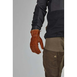 Hestra brown leather work glove with visible stitching worn on a hand