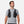 Man wearing a black Nathan hydration vest over a grey t-shirt
