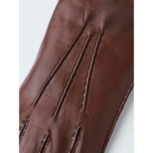 Brown Hestra leather glove showing decorative stitching on the back