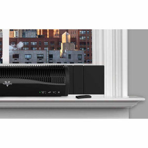 Vornado black tower heater with digital display and remote on a window sill
