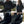 People wearing black G-Tech branded hoodies with front pockets