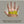 Hand being measured with a yellow tape measure to determine glove size