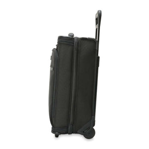 Side view of a black Briggs and Riley rolling carry on suitcase with extended handle