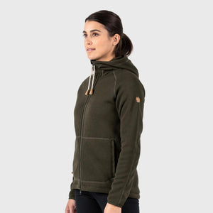 Woman wearing a dark green FjallRaven fleece hoodie with a front zipper