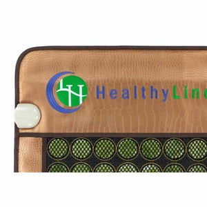 HealthyLine mat with textured copper surface and embedded green circular stones