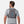 Man wearing a grey Nathan hydration vest from the back