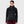 Woman wearing a black FjallRaven hooded fleece jacket with a chest pocket