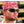 Man wearing a red paisley bandana and black sunglasses