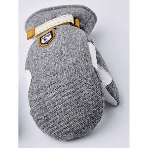 Hestra grey textured mitten with white leather palm and adjustable wrist strap