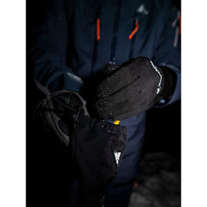 Person wearing Auclair black gloves with drawcord adjustment