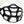 Due North black rubber ice traction cleat on the toe of a white shoe