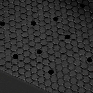 Black textured surface with a repeating hexagonal pattern and evenly spaced circular holes