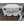 Back view of World Marketing Comfort Glow electric heater showing product label and power cord