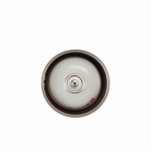 Top view of a metal camping fuel canister showing the valve nozzle